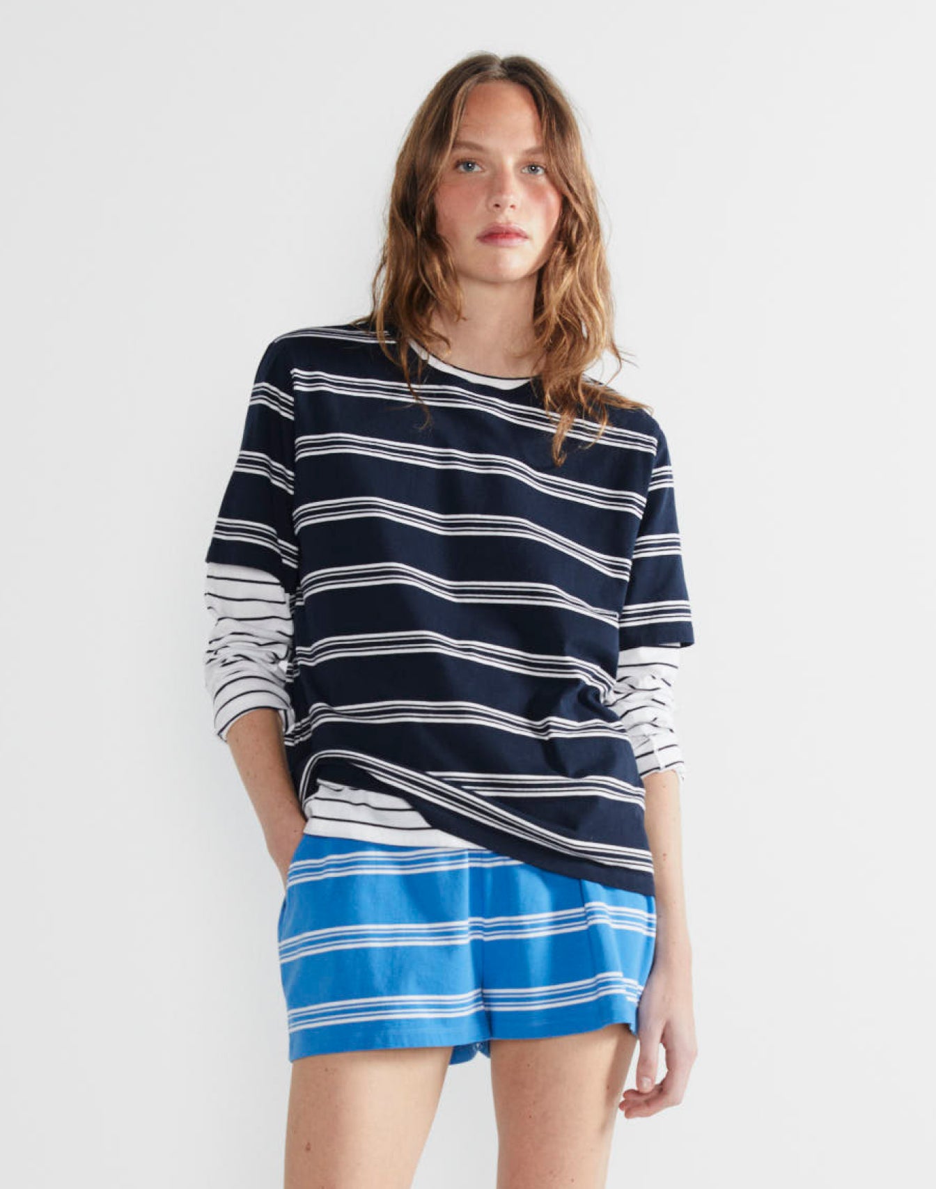 Model wearing The Modern - Navy/White Mixed Stripe and The Short - Royal/White Mixed Stripe