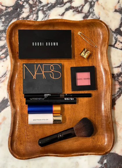 Tray of various beauty products and cosmetic items