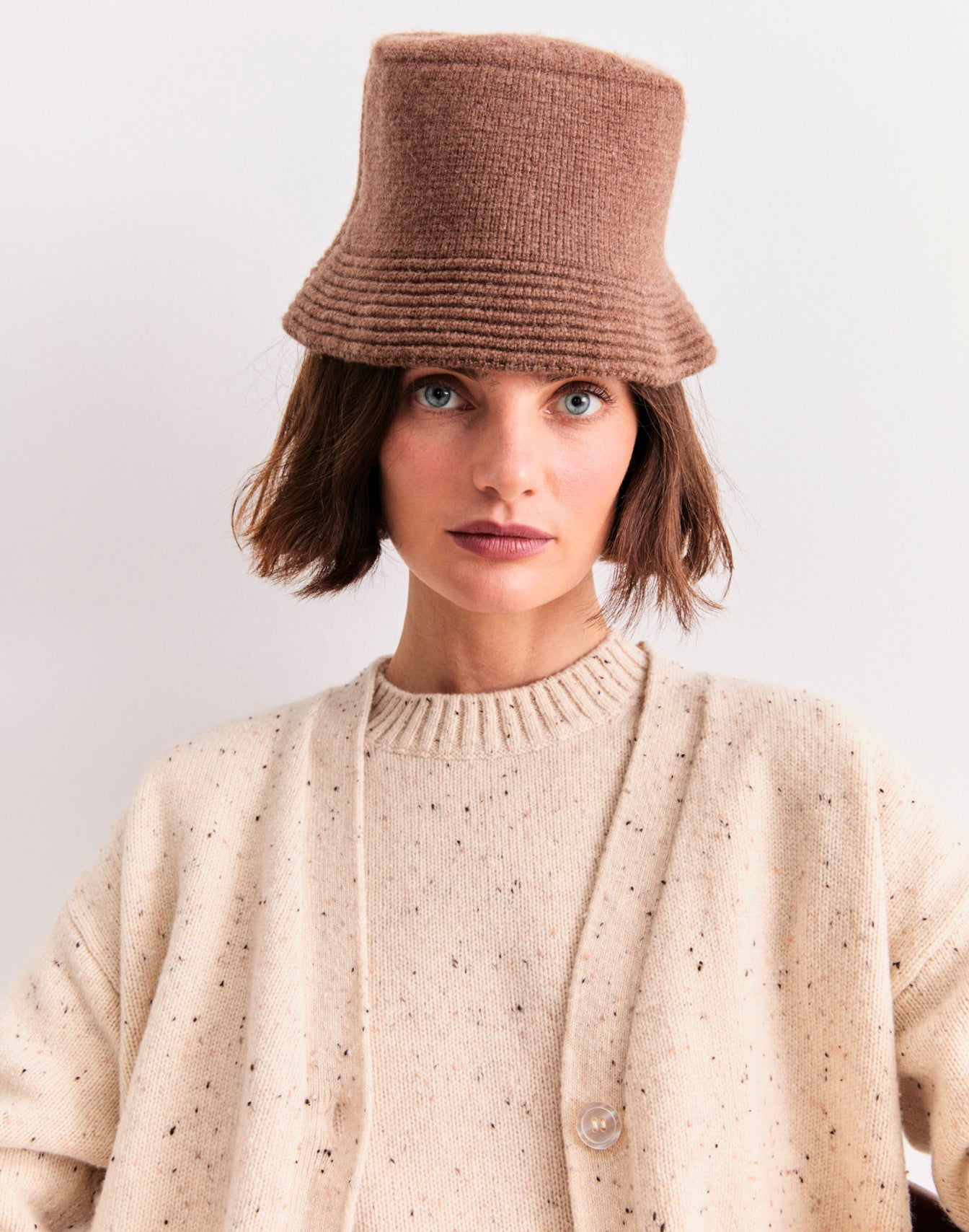 Model wearing The Jed - Coffee, The Cashmere Raffa - Oatmeal Donegal, and The Cashmere Tatum - Oatmeal Donegal