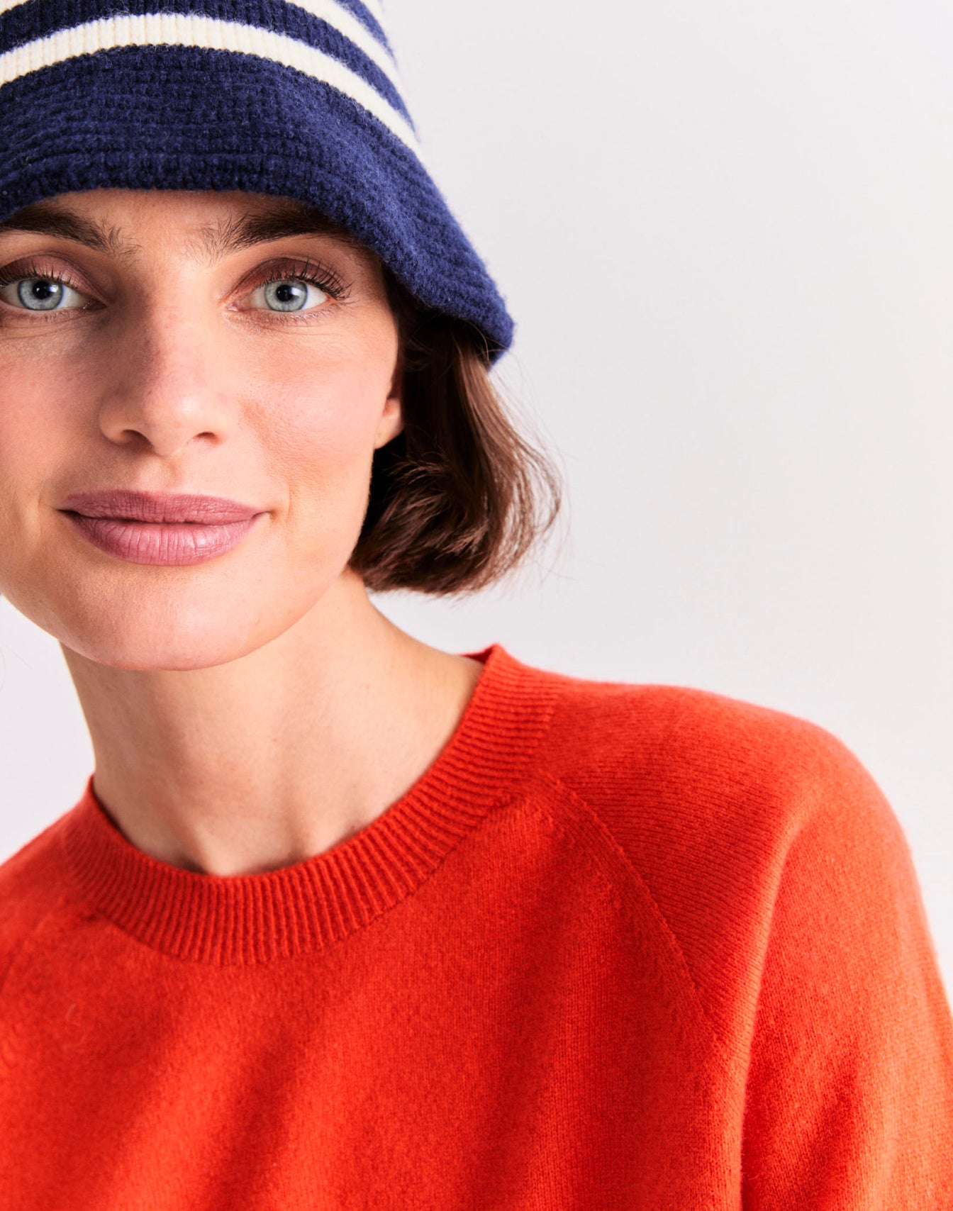 Zoomed in image of a model wearing The Sydney - Poppy and The Jed - Navy/Cream