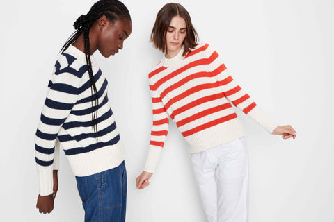 Two models wearing the Tatum striped sweater